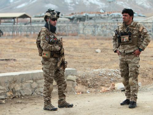 Afghan National Security Forces keep watch outside of a military compound after a car bomb blast on the outskirts of Ghazni city, Afghanistan November 29, 2020. REUTERS/Mustafa Andaleb