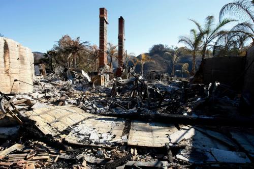 A home decimated by recent wildfires sits abandoned in a Yorba Linda, California neighborhood November 18, 2008. Evacuees are returning to three areas of southern California ravaged by wildfires, some finding their homes and cars reduced to piles of smoldering, melted rubble. REUTERS/Mike Blake (UNITED STATES)